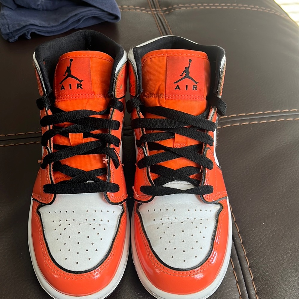 Orange black white Jordan 1 mid GS